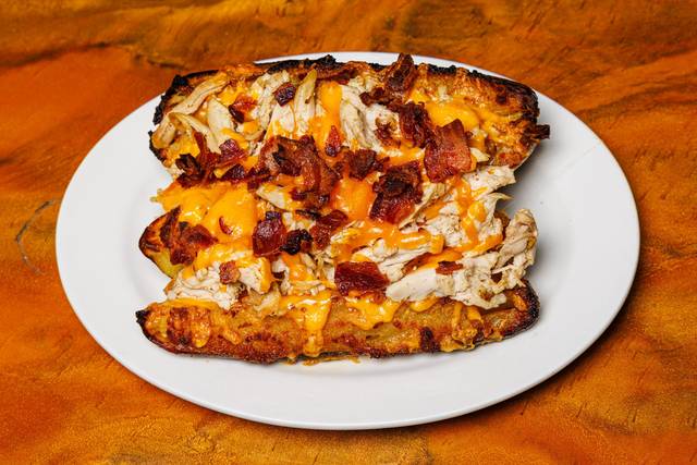 Smoked Chicken Bacon Loaded Baked Potato