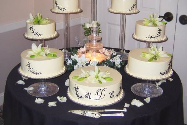 This multi-tiered cake surrounding a fountain creates drama at any reception.