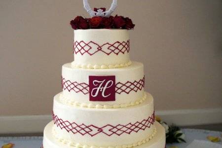 Red Celtic Knot encircling each layer, accented by a chocolate monogram