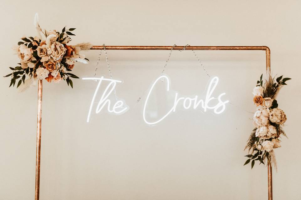 Neon sign backdrop for wedding