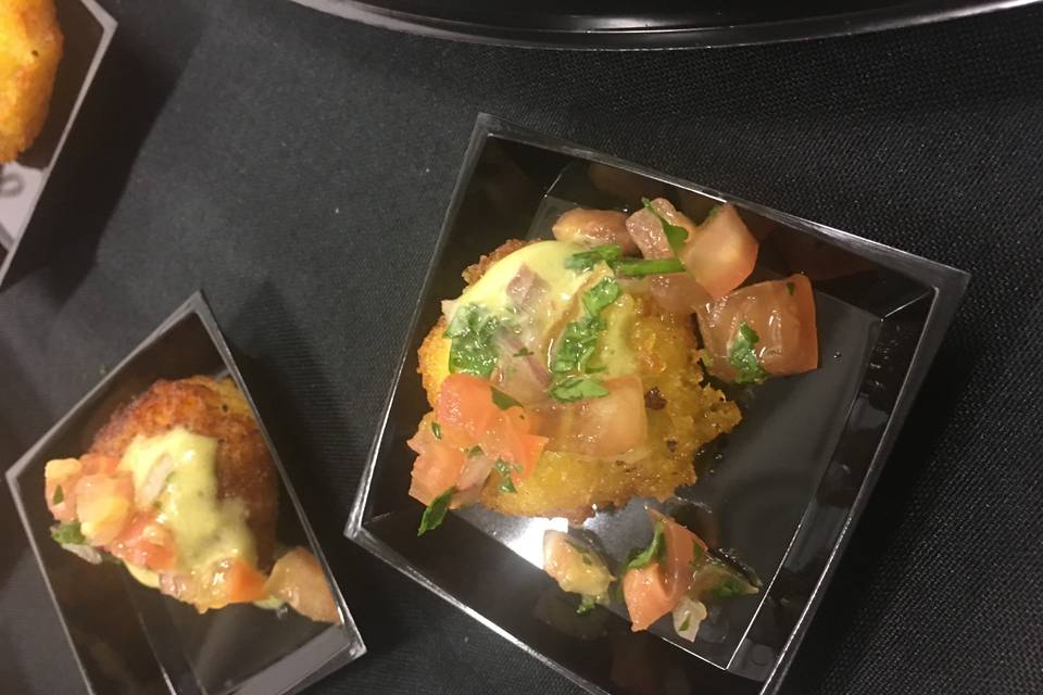 Golden corn cake topped w/ poblano cream sauce