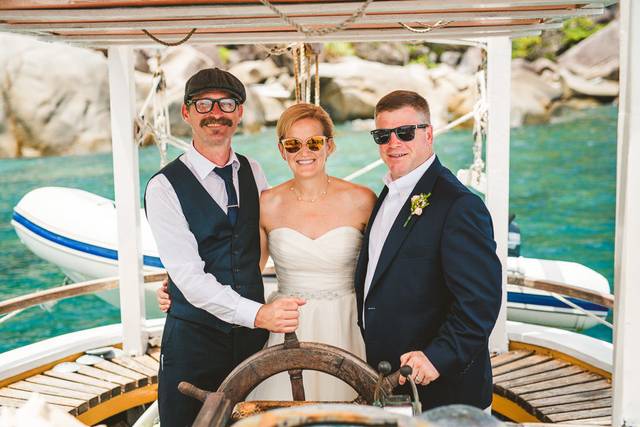 With the officiant, and captain!