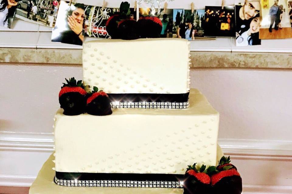 Square wedding cake with black and red