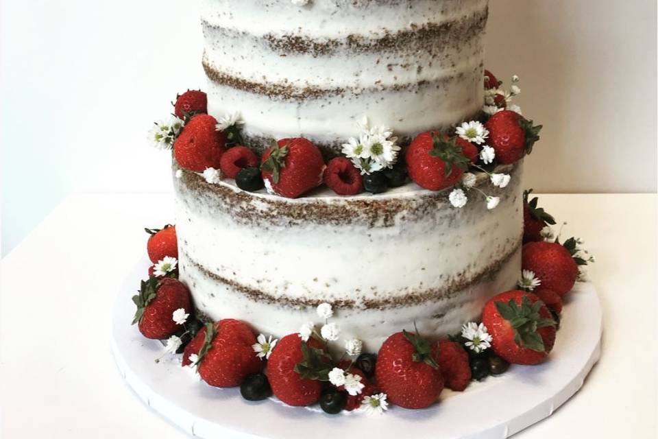 Naked wedding cake with berries