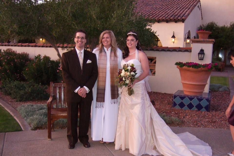 Couple with the officiant