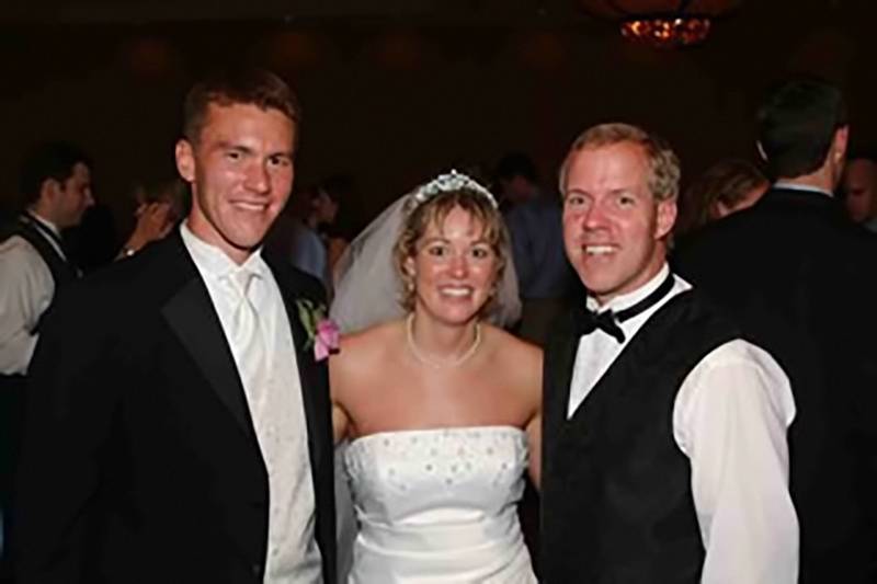 Groom and bride with the DJ