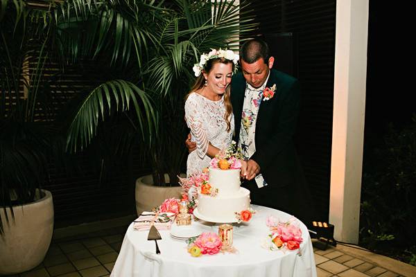 Couple slicing the cake