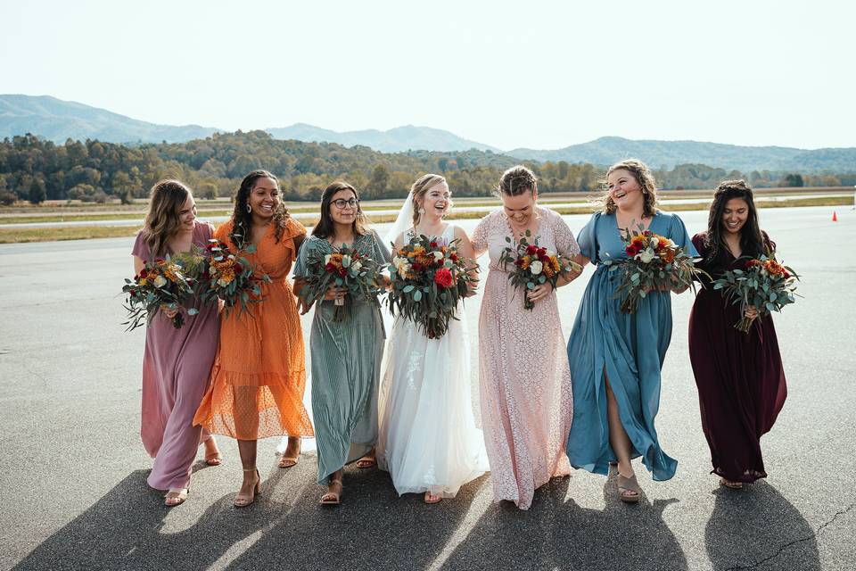 Bridesmaids on airport runway