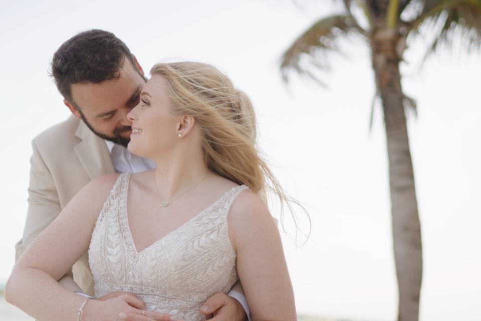 Bride and groom on beach