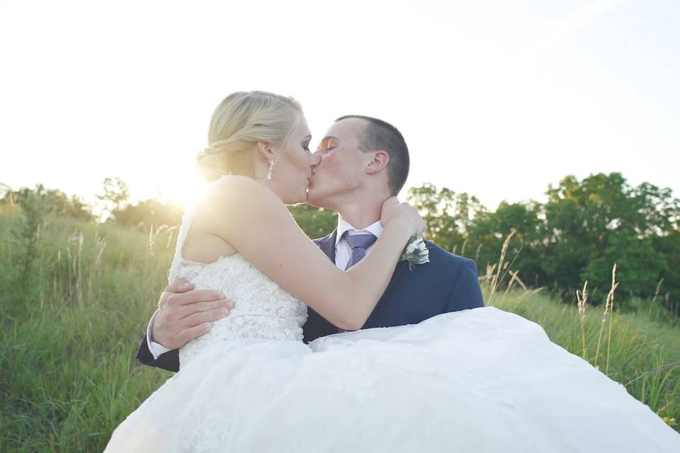 Bride and groom kissing