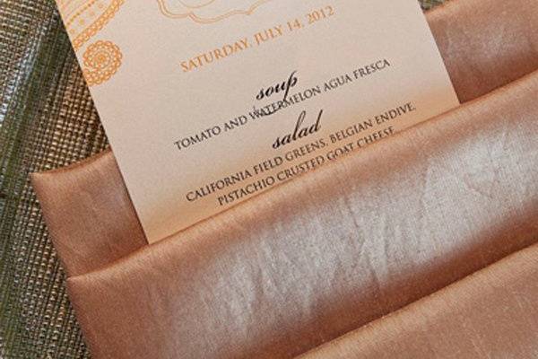 Monogram and paisley design menu cards. Gold and black inks printed on champagne shimmer paper.