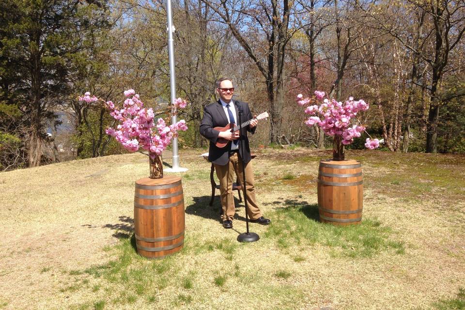 Johnny and his ukulele outdoors