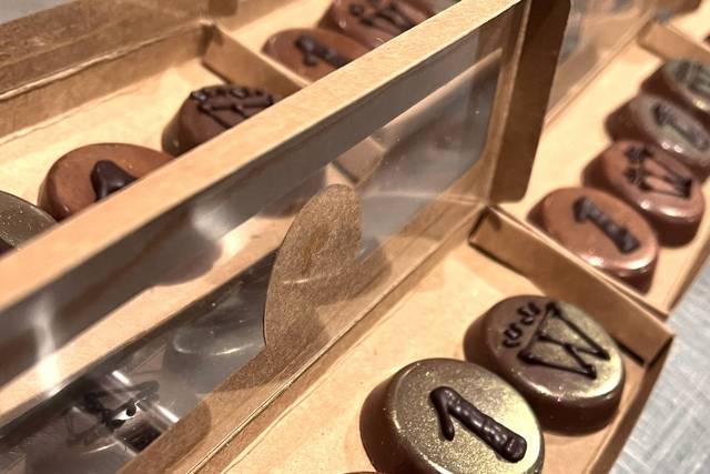 Hand piped chocolate coins