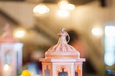 Lantern & garland centerpiece on farm table