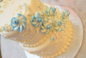 White wedding cake with a touch of blue
