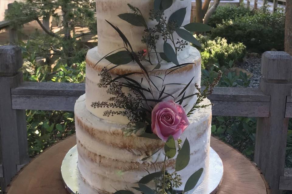 Naked white cake with floral