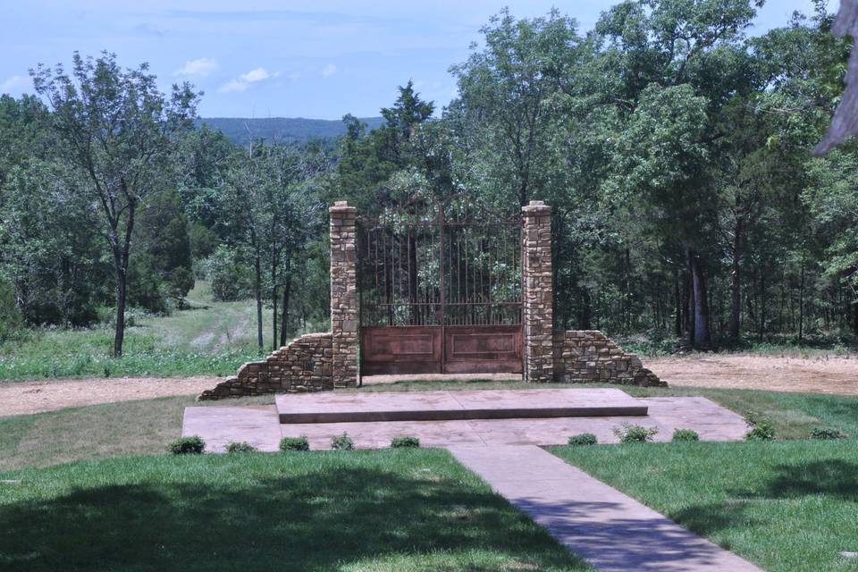 Say your vows in a beautiful and natural surrounding with your ceremony taking place in front of the antique European iron gates at Stone Gate Farm.