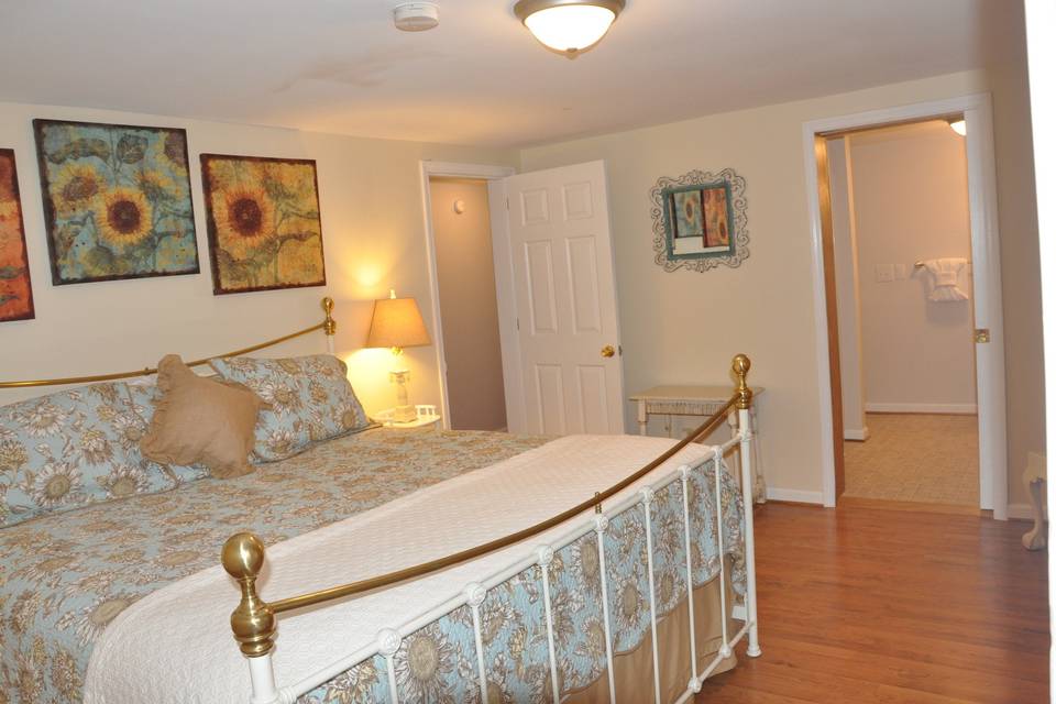 Downstairs bedroom at the guest house with king size bed and private bathroom.