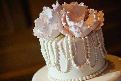 White wedding cake with pearls