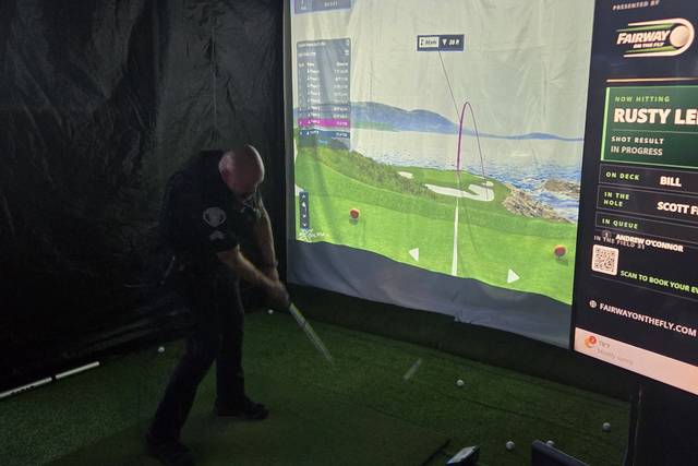 01-fairway-guest-mid-swing.jpg