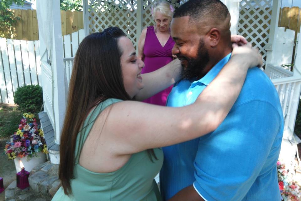 Bride and groom embracing each other