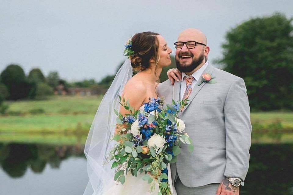 Newlyweds by the pond