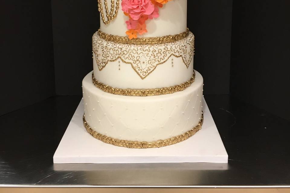 Gold Elegance Wedding Cake with Cascading Sugar Flowers
