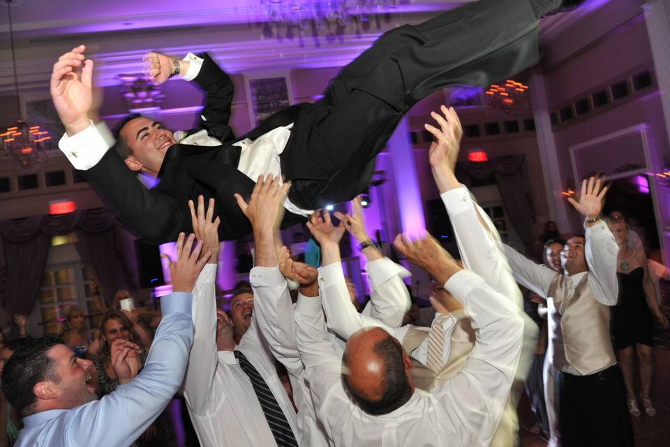 GROOM FLYING HIGH