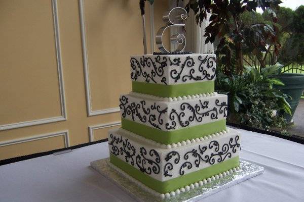 Unique combination of lime green and black on this square cake