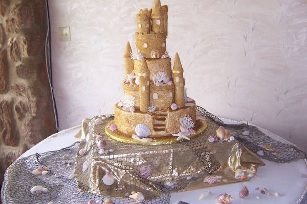 Sandcastle theme was this brides dream. We even made the topper.