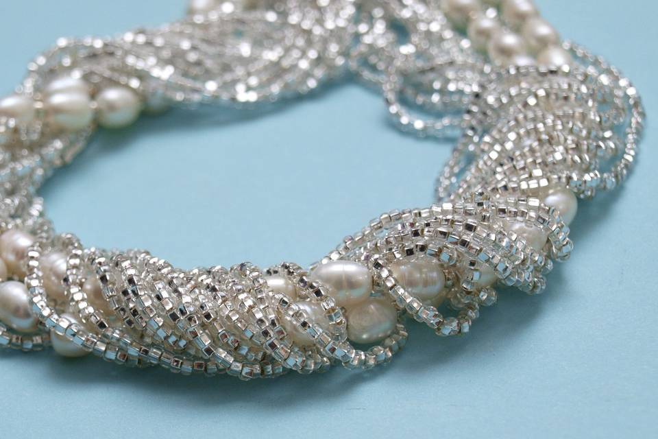 Custom Necklace with swavorski crystals and freshwater pearls intertwined with czech seed beads!