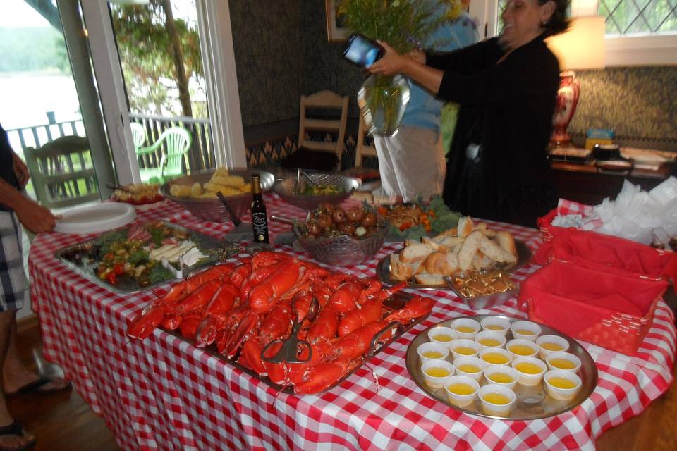 Intimate lobster bake birthday in client's home.
