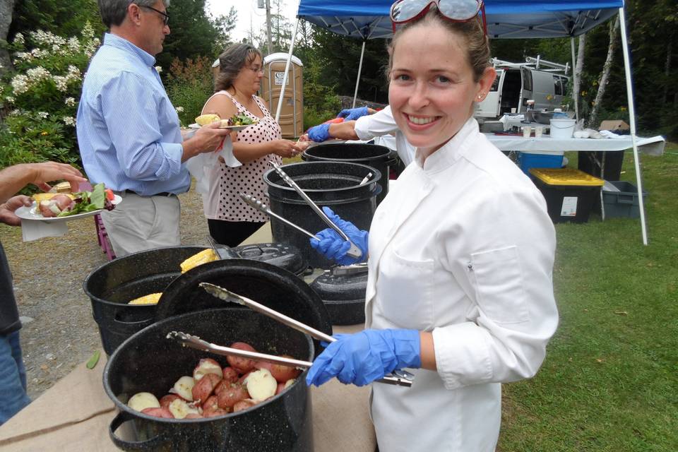 Casual buffet service using typical Maine lobster pots.