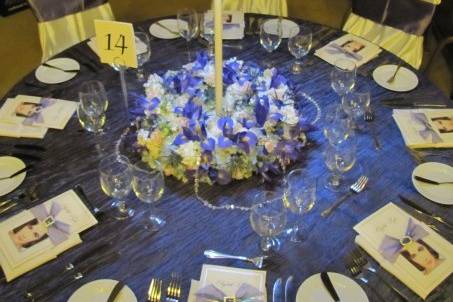 Table setting with tall floral centerpiece