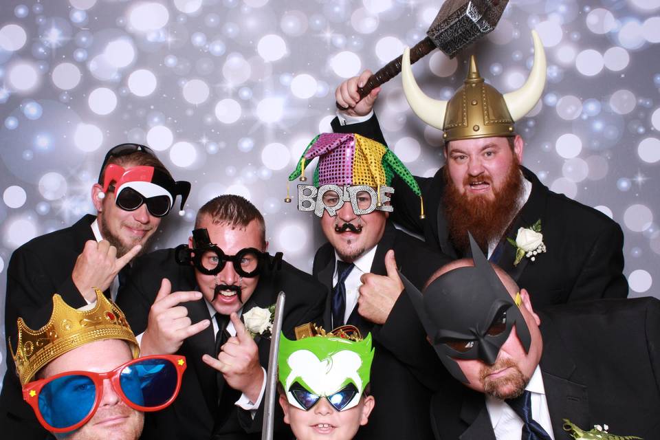 Photo booth groomsmen shot