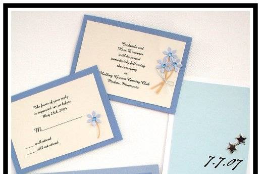 A variety of Blue Wedding Invitations with embellishments.  Sizes shown are the 5x7 & tea length.