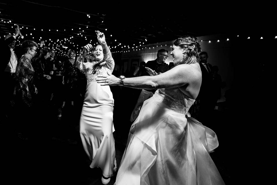 Two brides dancing