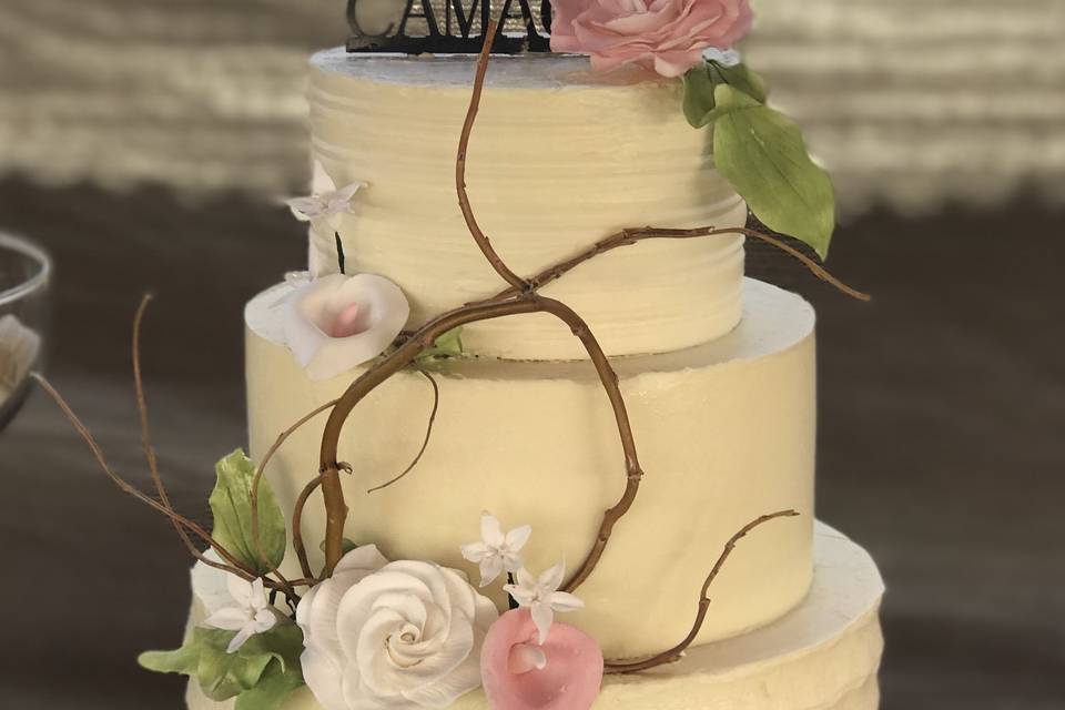 3-tier wedding cake with flowers