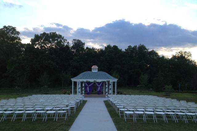 Ceremony Site within the vineyard.  Beautiful views of the Catocin Mountains, grape vines, and the lovely bride and groom
