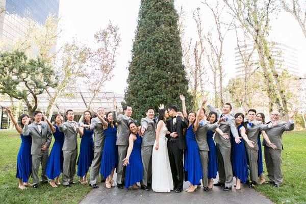 The couple with the bridesmaids and groomsmen