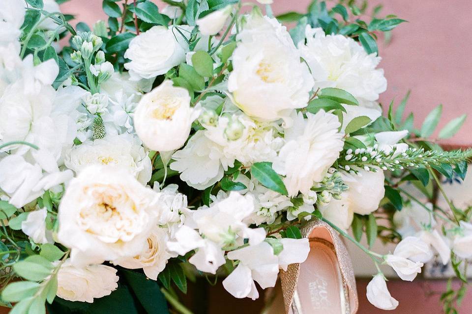 Bridal shoes and bouquet