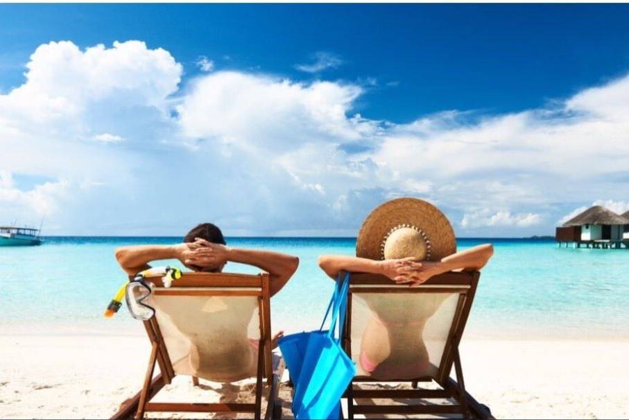 Couple relaxing on the beach