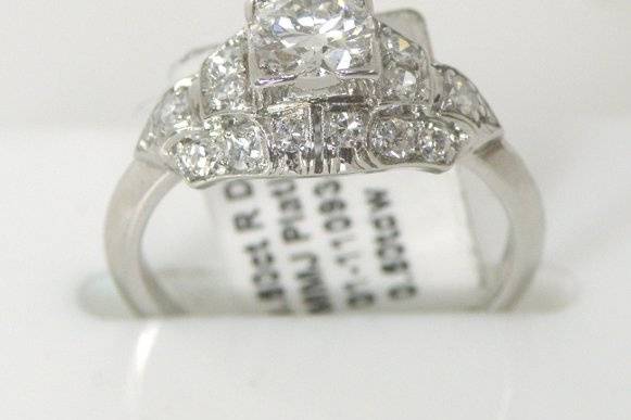 Ladies Vintage Platinum Diamond Ring 1 Europian Cut Center Diamond Totaling .50Ct I/Vs 18 Single Cut Diamonds Totaling .35Ct G/Vs Size64.1Gr