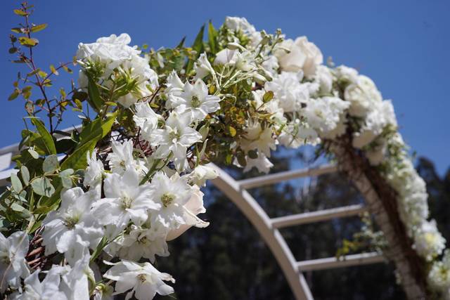 spring archway decorated in white.