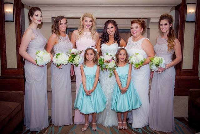 Bride, bridesmaids, and flower girls