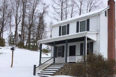 Farmhouse in the Snow