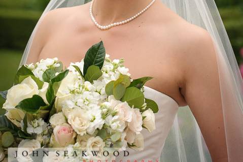 White round roses | Photo: John Seakwood PhotographyMakeup: Allison Barbera