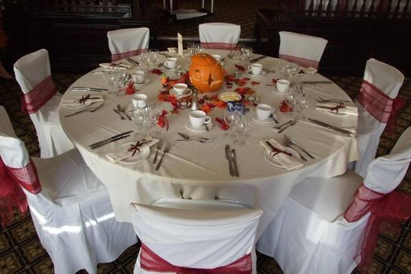Ivory Chair Covers With Burgundy Sashes
