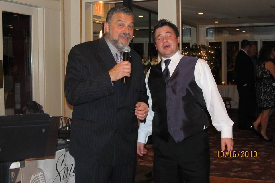 Groom and the singer duet