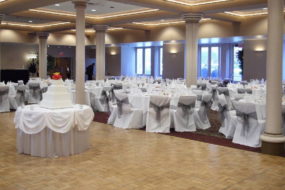 Pink ribbon decor on reception chairs